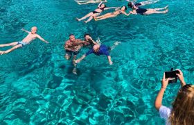 swimming in crystal clear water