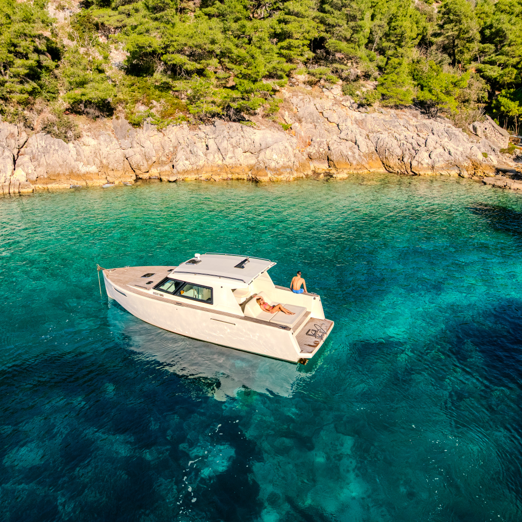 White boat near coast at the Blue Lagoon in Croatia