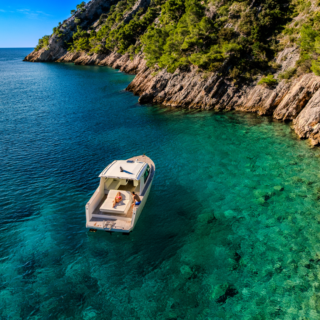 Secluded bay with boat anchored